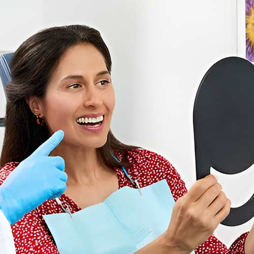sure-smile-woman-looking-at-mirror